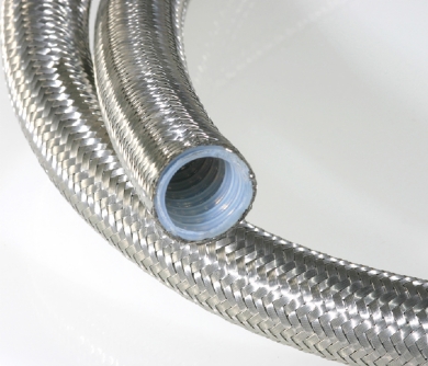 Click to enlarge - Convoluted PTFE overbraided hose offering superb flexibility and a very wide resistance to many chemicals, gases, fluids, etc. This new design offers all the advantages of a smooth bore with the flexibility of a convoluted hose.